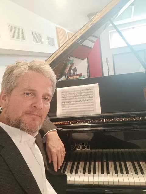 Italian pianist Alberto Nones with Fazioli piano