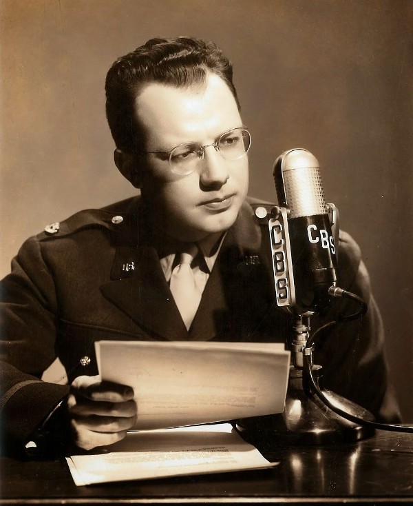 CBS war correspondent Bill Downs sits before a microphone in London, 1942
