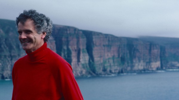 Sir Peter Maxwell Davies on the ferry to Orkney with the cliffs of Hoy pictured in the background
