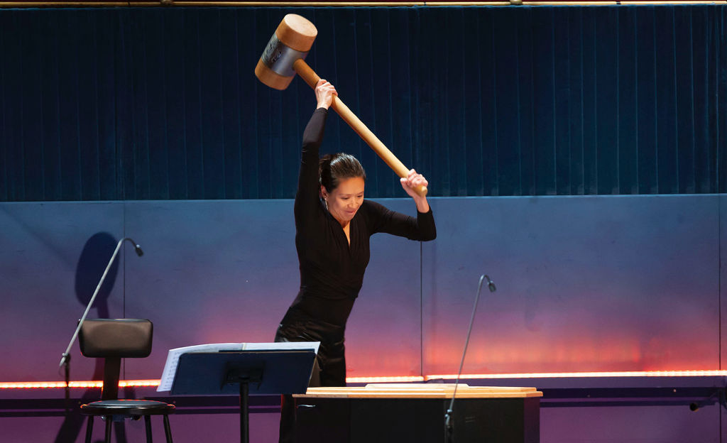 During a 2008 tour stop at London's Royal Albert Hall, Cynthia Yeh, principal percussion, wields the hammer of fate as the Chicago Symphony Orchestra performs Mahler's Symphony No. 6. Todd Rosenberg Photography