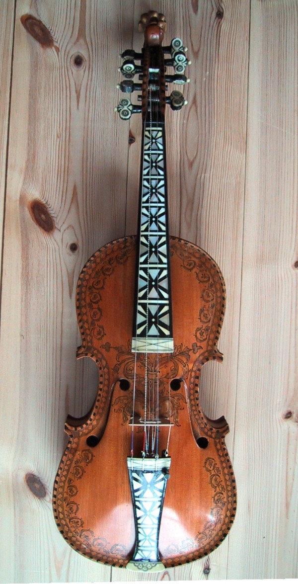 A Hardanger fiddle made by Knut Gunnarsson Helland. Owned by Monica Skaro, who inherited it from her grandfather Knut Skaro from Geilo, Norway.