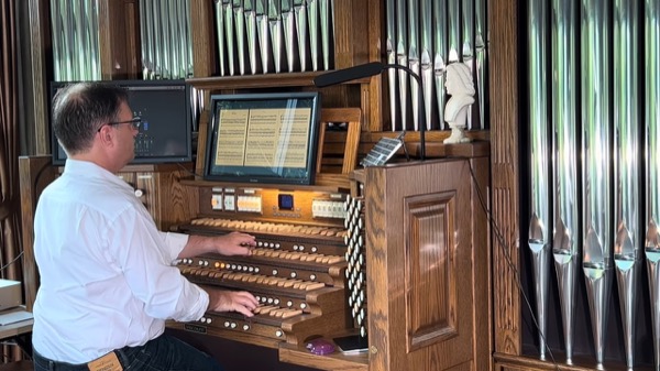 David Hicken at the organ