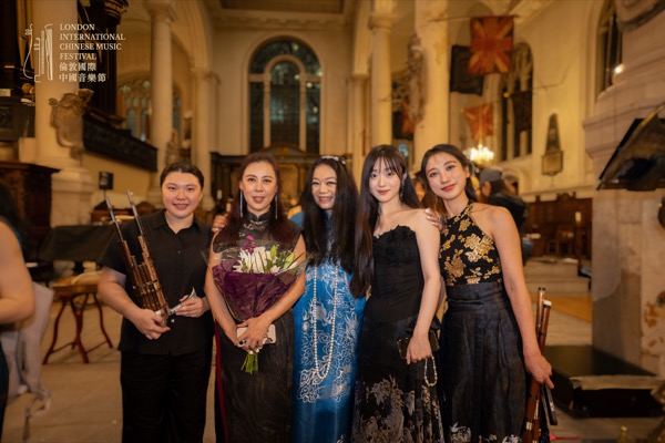 Group photo with other players in the ensemble