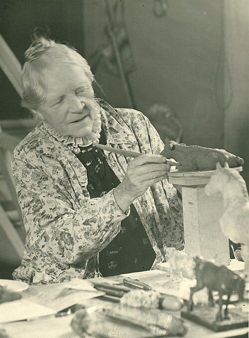 Anne Marie Carl-Nielsen working on a sculpture
