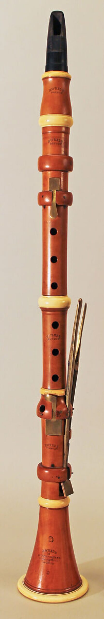 Clarinet in C, Hermann Wrede, Boxwood, ivory, brass, British. The British clarinet in C pictured here, built in the early 19th century, would be similar in appearance to Cavallini’s (collection of The Met, Object Number 1997.219.10).