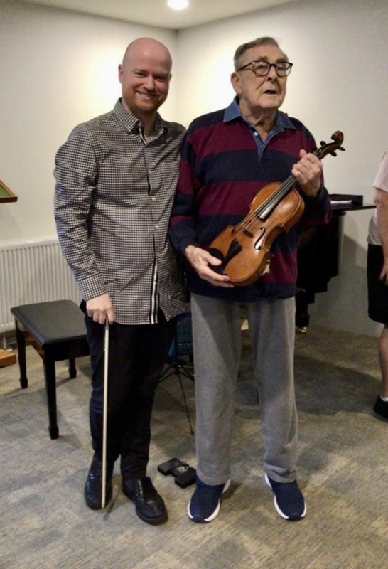 Don Scotts and Patrick Savage after a concert at a care home, 2023